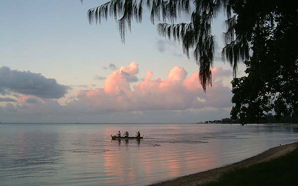 Paddling out at sunset